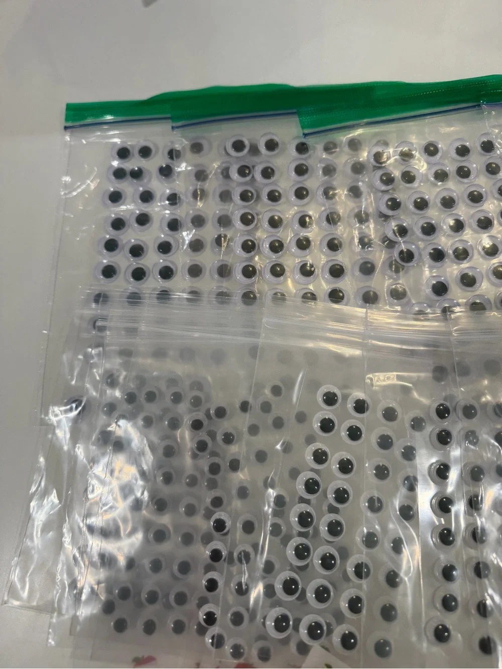 Bundle of back to school apple stickers, googly eyes, & transportation sticker